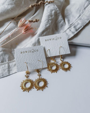 Sun deals dangle earrings